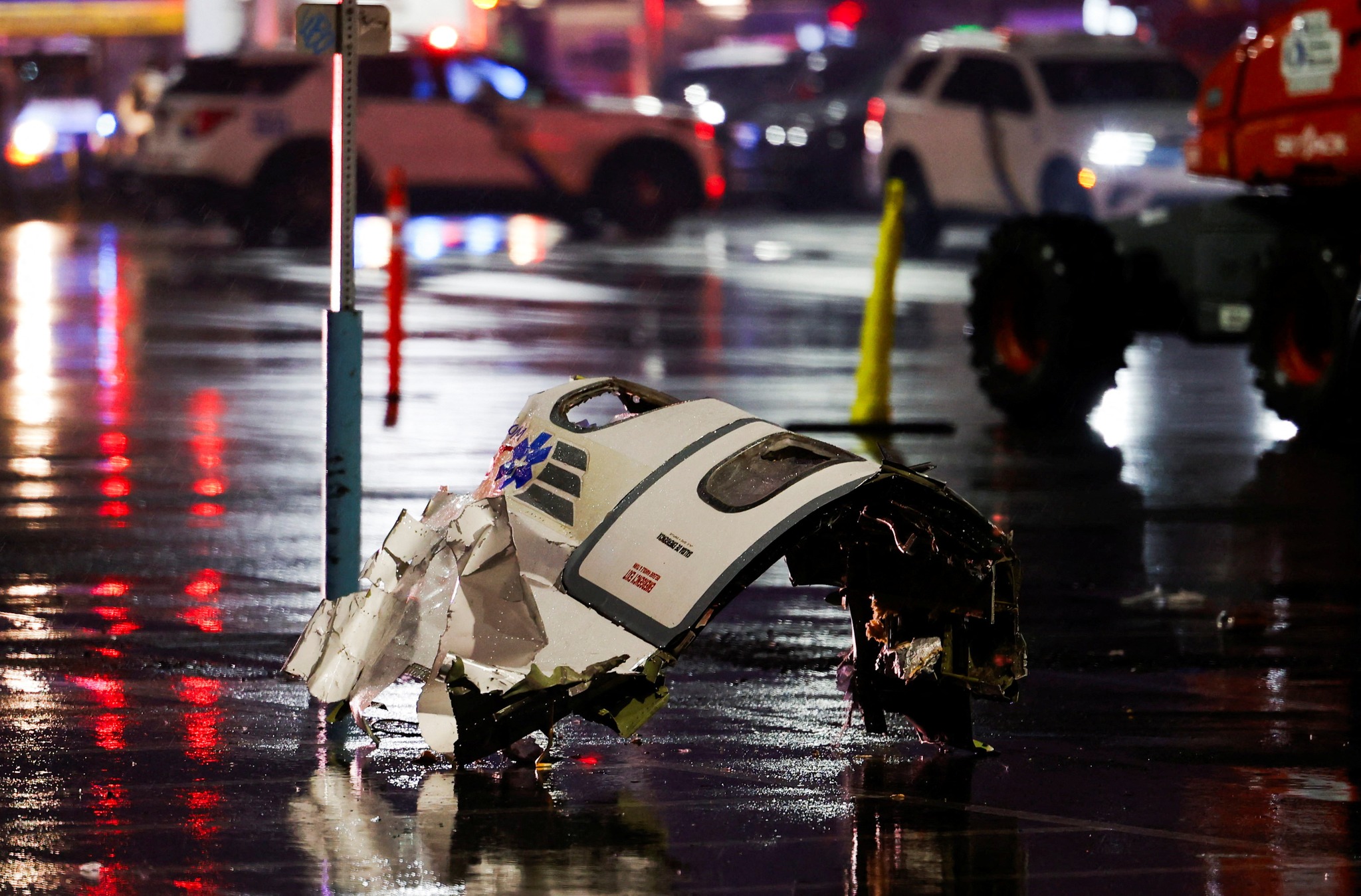 Debris of the aircraft lies on the ground at the site of a plane crash in Philadelphia, Pennsylvania, U.S., January 31, 2025. REUTERS/Rachel Wisniewski     TPX IMAGES OF THE DAY